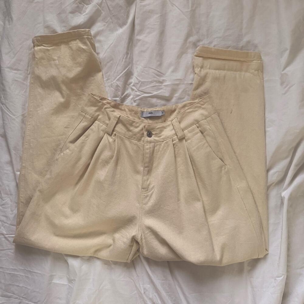 Cream mid waisted trousers